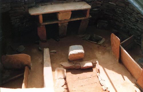 Inside this hut you can clearly see the stone Sleeping area inside the Neolithic house at Skara Brae, Orkney.